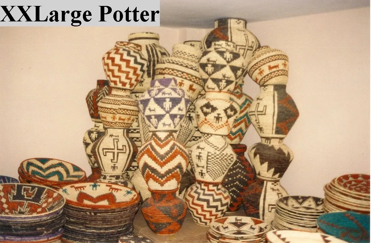 Stacked decorative pots with intricate patterns.